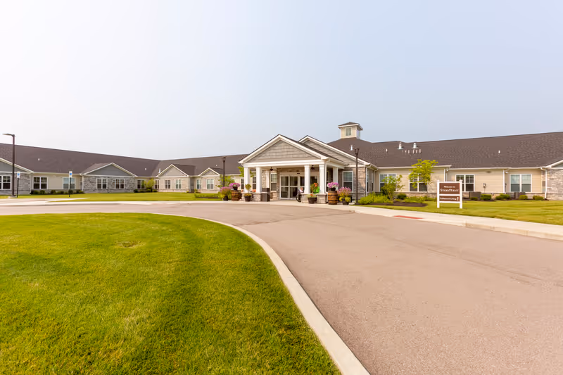 Exterior view of StoryPoint Union facility showing a large single-story building with a covered entrance, surrounded by well-maintained green lawns and a paved driveway.