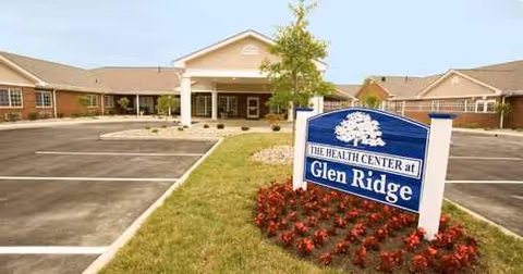 Exterior view of Glen Ridge Health Campus with sign and landscaped entrance.