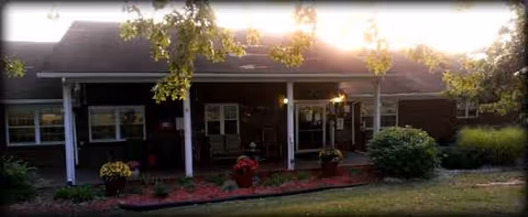 Front exterior view of Elizabethtown Nursing & Rehabilitation Center with entrance and landscaping.